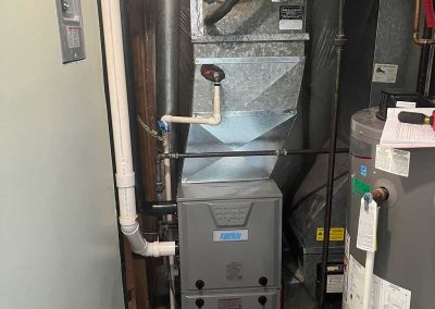 Amplified HVAC furnace next to water tank